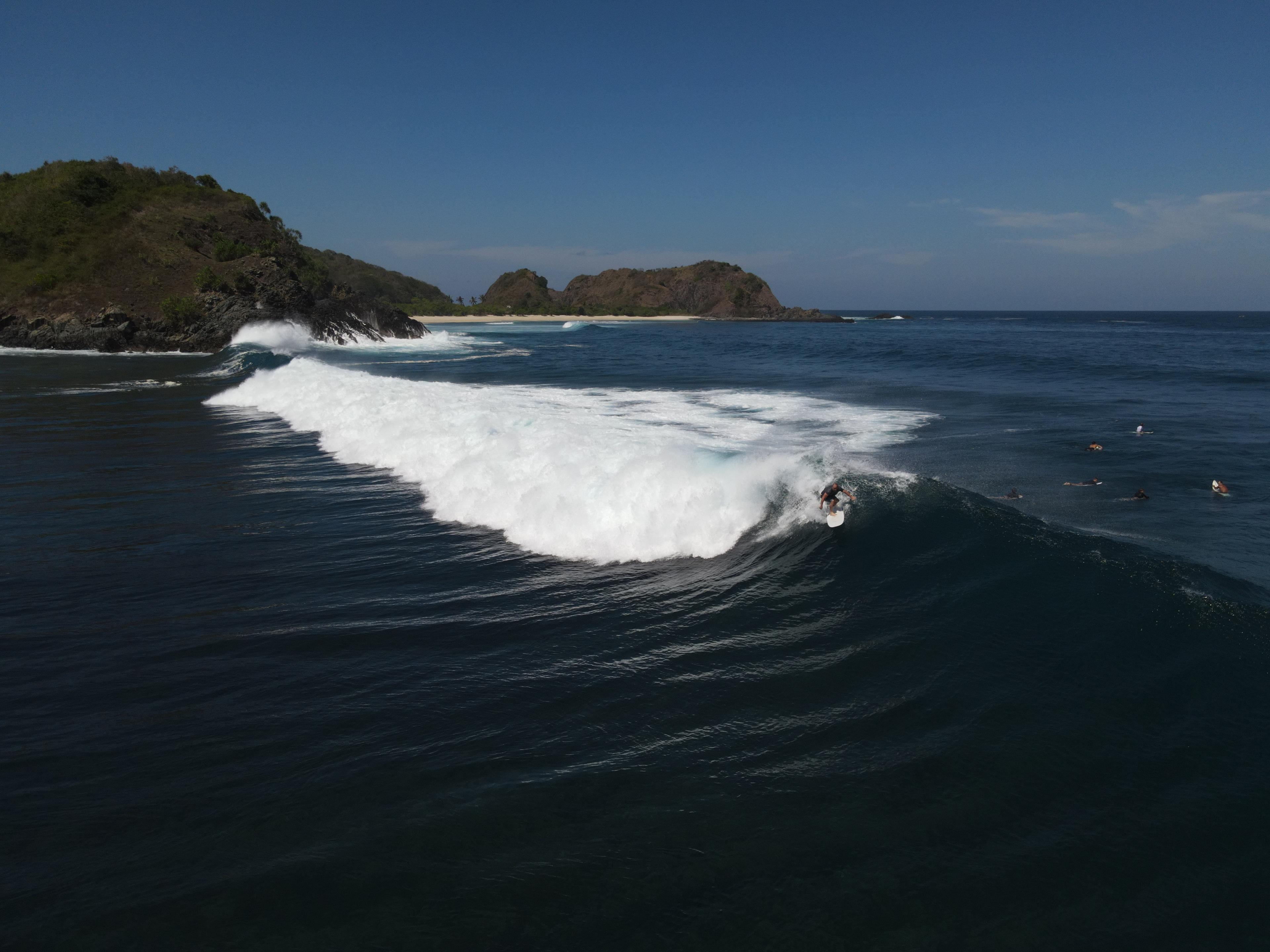 Mawi surf break and the rugged hills of South Lombok