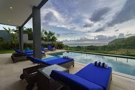 Villa K poolside loungers with ocean view, Torok, South Lombok